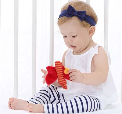 Pliušinis barškutis SIGIKID oranžinis drugelis 9 cm.